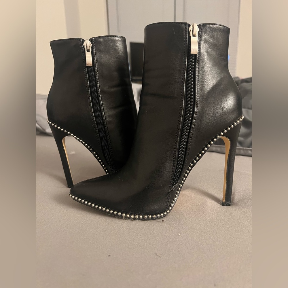 Black studded ankle boot heels